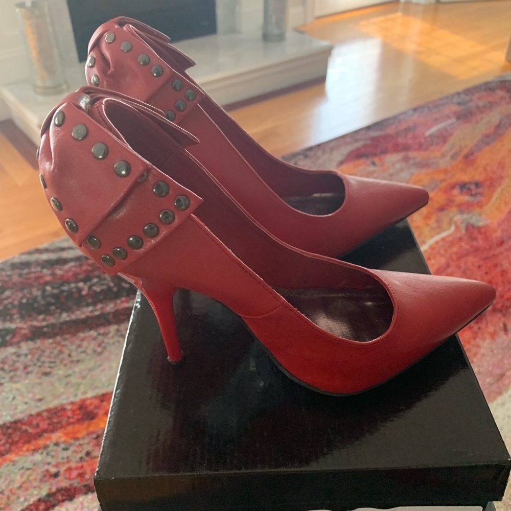 Brand new, never worn red studded heel